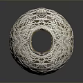 Intricate Spherical Sculpture Carving With Hollow White Patterns And Detailed Design
