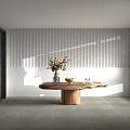 Natural Edge Wooden Coffee Table With Flower Vase Bowl of Fruits and Stack of Books