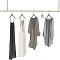 Elegant Dresses For Two Women On Gold Rack