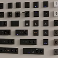 Various Modern Electrical Switches And Sockets In Different Designs On Wall 3d model