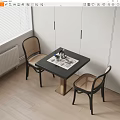 Black Dining Table Set with Rattan Chairs Placemat Vase Cups and White Cabinets