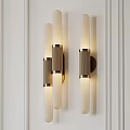Elegant Modern Cylindrical Wall Lamp With Gold Accent Mounted On White Wall