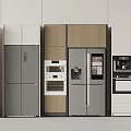 Refrigerators and Freezers in Modern Kitchen With Various Colors Wooden Panels and Stainless Steel Finishes