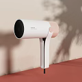 Modern White and Pink Hair Dryer as Daily Electrical Appliance on Red Surface with Shadow