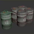 Group of Silver Metal Drums With Green Ropes And Warning Labels