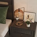 Wooden Bedside Table With Modern Lamp Astronaut Figurine Framed Art And White Vase In Bedroom