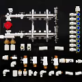 Assorted White And Brass Plumbing Fittings With Manifold Valves And Connectors Components