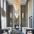 Double Height Duplex Living Room Interior With Crystal Chandeliers Paneled Walls And Sofa