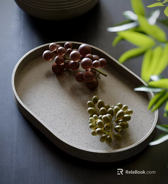 Deep red and light green grapes on oval shallow plate with green leaves beside 3d model 