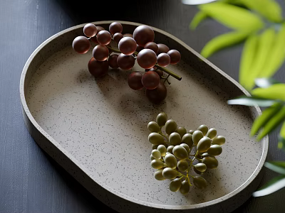Deep red and light green grapes on oval shallow plate with green leaves beside 3d model
