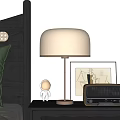 Bedside Table Setup With Table Lamp Astronaut Figurine Radio And Wall Painting