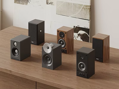 Modern Audio Speakers in Various Designs Placed on Wooden Tabletop with Decorative Background 3d model