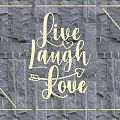 Illuminated Lighting Combination With Live Laugh Love Text And Strip Lights On Dark Stone Wall