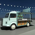 Light Blue Beer Bar Food Truck with String Lights and Open Service Window