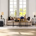 Beige Sofa and Glass Coffee Table Set with Decorative Pillows Gold Frame and Natural Light