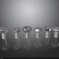 Metal Bolts With Various Head Shapes Arranged On Black Background With Reflective Finish