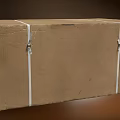 Sturdy Brown Cardboard Box Secured with White Straps and Metal Buckles