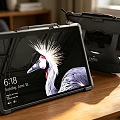 Tablet With Protective Case And Stand Displaying June 18 Date And Bird Wallpaper