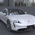 White Sports Car With Sleek Aerodynamic Body Front Grille And LED Headlights In Outdoor Setting