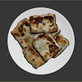 Golden Brown Crispy Pan Fried Dumplings Stacked On White Plate