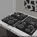 Modern Black Electric Cooktops On Marble Countertop In Kitchen Interior
