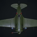 Vintage Green Fighter Plane with Propeller and Red Star Markings on Dark Background