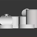 Multiple Silver Reflective Metal Cans for Food Storage in Various Shapes on Black Background