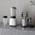 Kitchen Countertop Appliances on Gray Granite Surface with Blender Food Processor and Transparent Cup