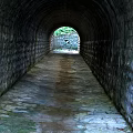 Stone Tunnel Pathway With Weathered Stone Walls And End Greenery Light 3d model