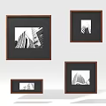 Black and White Architecture Photos in Wooden Frames of Various Sizes Arranged on White Background