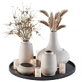 White Ceramic Vases With Dried Plants And Patterned Candles On Black Tray For Home Decor