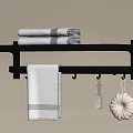 Bathroom Wall Shelf With Folded Towels Hanging Towel Hooks And Decorative Items