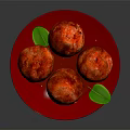 Appetizing Four Baked Meatballs Served on Red Plate with Fresh Green Leaf