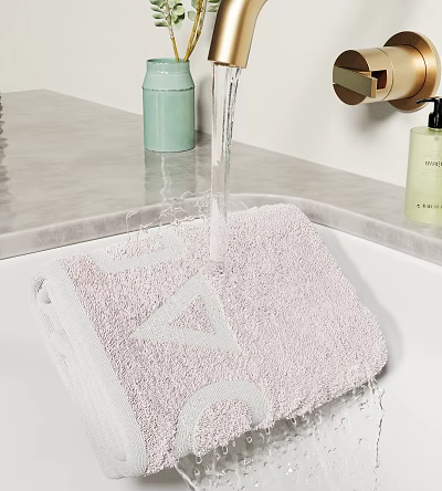 Pink Towel And Green Vase With Fresh Flowers By Sink With Running Water 3d model