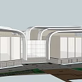 Modern Museum Building Exterior With Curved Design And Large Glass Windows