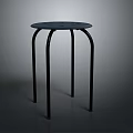 Black Round Small Table With Four Thin Legs And Perforated Top 3d model