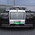 Luxury Rolls Royce Sedan Black Silver with Chrome Front Grille Iconic Emblem Green License Plate