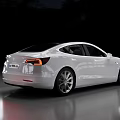 White Modern Electric Sedan With Sleek Exterior And Silver Alloy Wheels