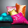 Colorful Decorative Pillows Stacked With Blue Pink Orange Gold Patterns And Solid Designs