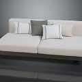 Multi Person White Sofa With Striped And Solid Color Cushions And Dark Wooden Base