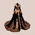 Elegant Black and Gold Dress With Intricate Embroidery Long Sleeves and Flared Train