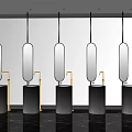Modern Public Restroom Interior With Black Cylindrical Basins Oval Mirrors And Brass Faucets