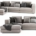 Gray Sectional Sofa With Multiple Decorative Pillows And Cozy Throw Blanket 3d model
