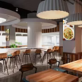 Modern Restaurant Interior With Circular Bar Comfortable Chairs Decorative Wall And Pendant Lights