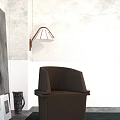 Comfortable Brown Fabric Accent Chair in Modern Room with Gray White Walls and Wall Lamp