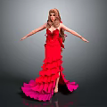 Woman with Long Golden Hair in Red Layered Dress Arms Outstretched on Shiny Floor