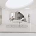 Modern Minimalist Living and Dining Room With White Sofa Dining Table Chairs Archway and Staircase