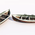 Two Vintage Wooden Boats With Weathered Wood Planks And Classic Hull Design