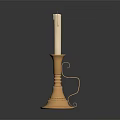 Gold Candle Lamp With White Candle Curved Handle And Round Base On Dark Background