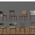 Eight Dining Chairs With Various Designs Against Light Colored Walls And Wooden Floor